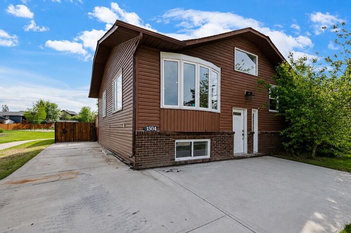 Property Photo: 1504 Big Springs Way SE AB T4A 1N3