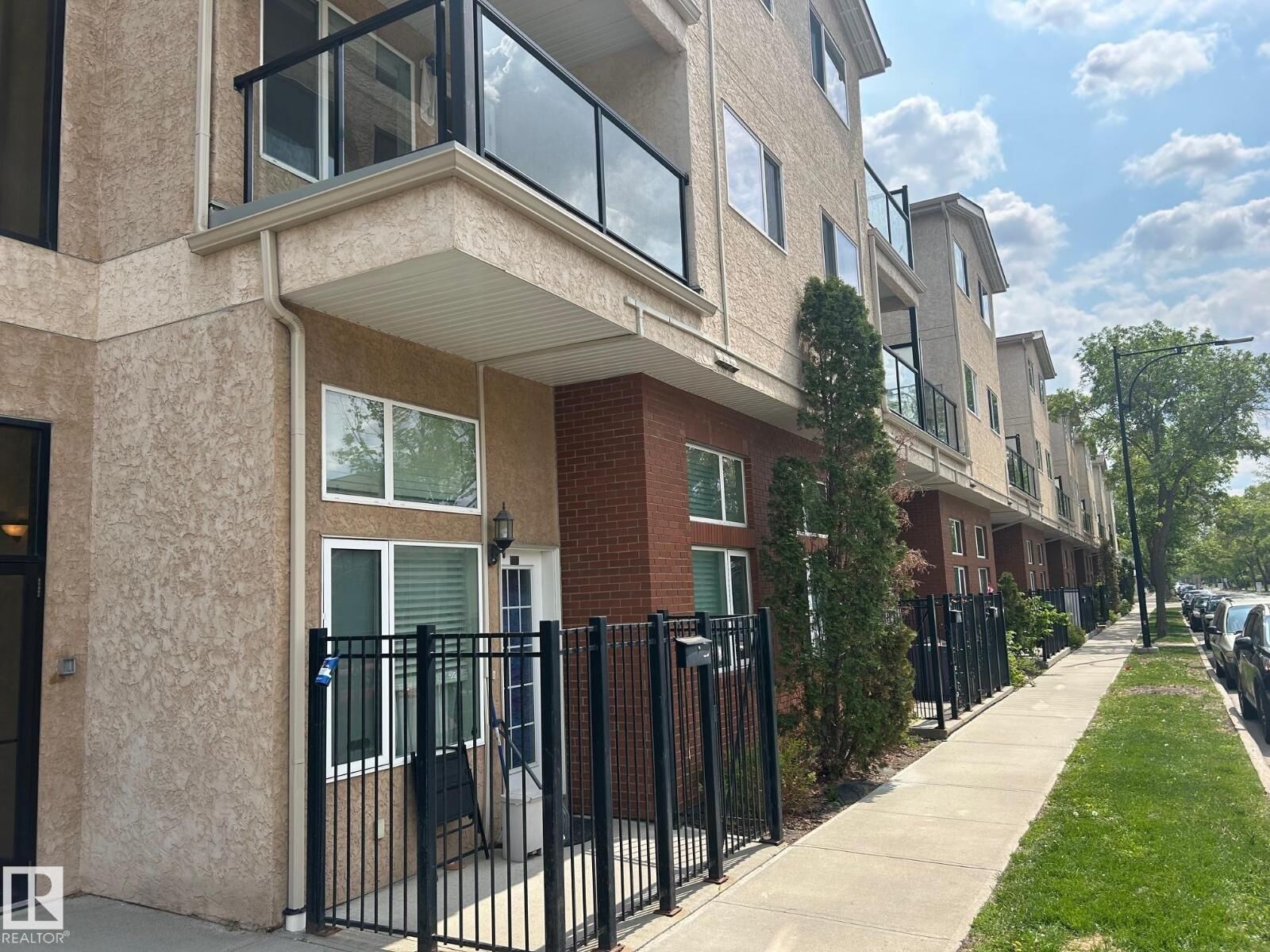 Property Photo:  #213 11033 127 St NW  AB T5M 0T3 