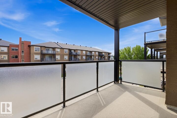 Property Photo:  13908 136 Street NW 312  AB T6V 1Y5 