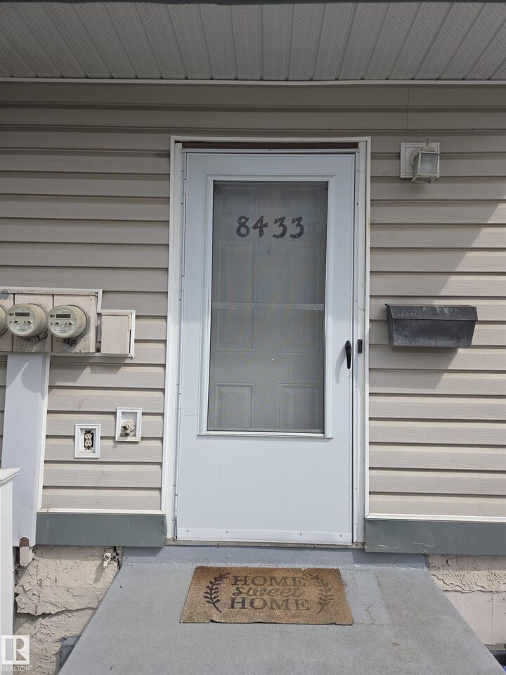 Property Photo:  8433 29 Avenue NW  AB T6K 3M8 