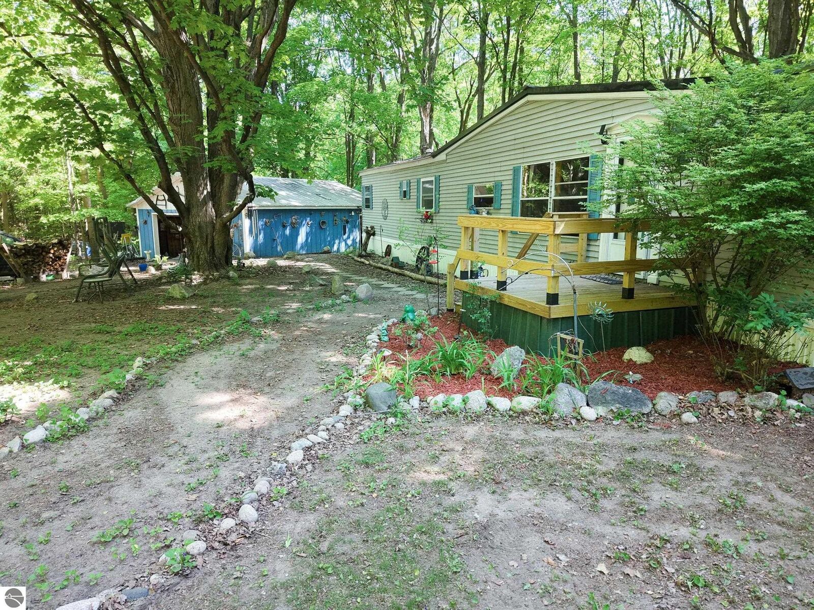 Property Photo:  13517 Viaduct Road  MI 49625 