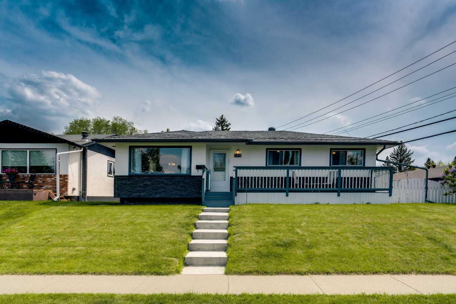 Property Photo: 249 Acadia Drive SE AB T2J 0A6