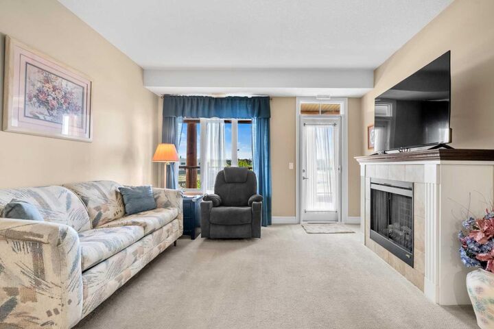 Property Photo: 2330 Fish Creek Boulevard SW 2303 AB T2Y 0L1