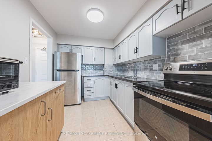Property Photo: 180 Limeridge Road W 103 ON L9C 7H7