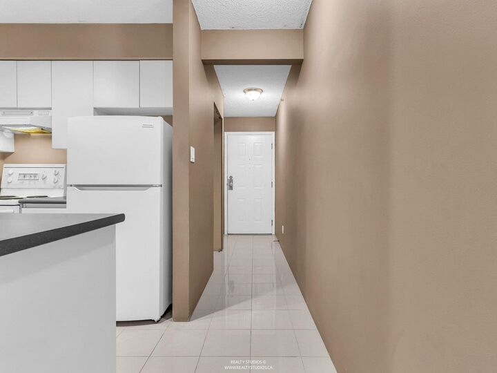 Property Photo:  3489 Ascot Place 206  BC V5R 6B6 