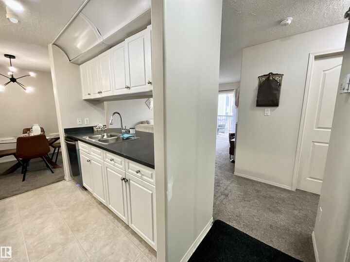 Property Photo: 16303 95 Street NW 217 AB T5Z 3V1