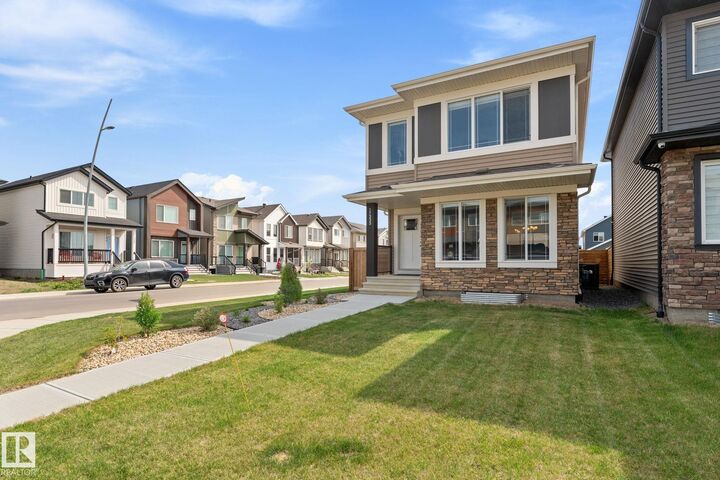 Property Photo:  17355 6 Street NE  AB T5Y 4G1 