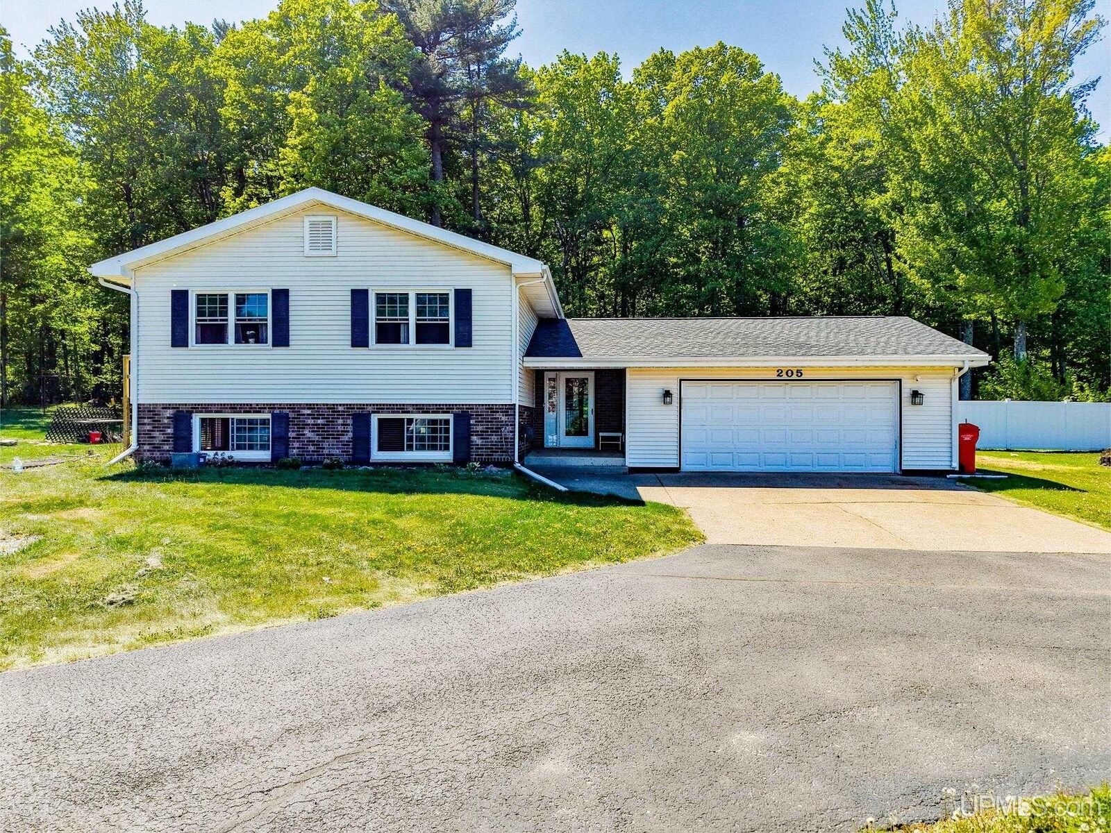 Property Photo:  205 N Rose Street  MI 49849 