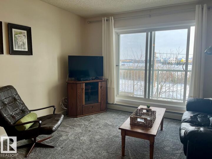 Property Photo:  70 Woodsmere Close 324  AB T8L 4R8 
