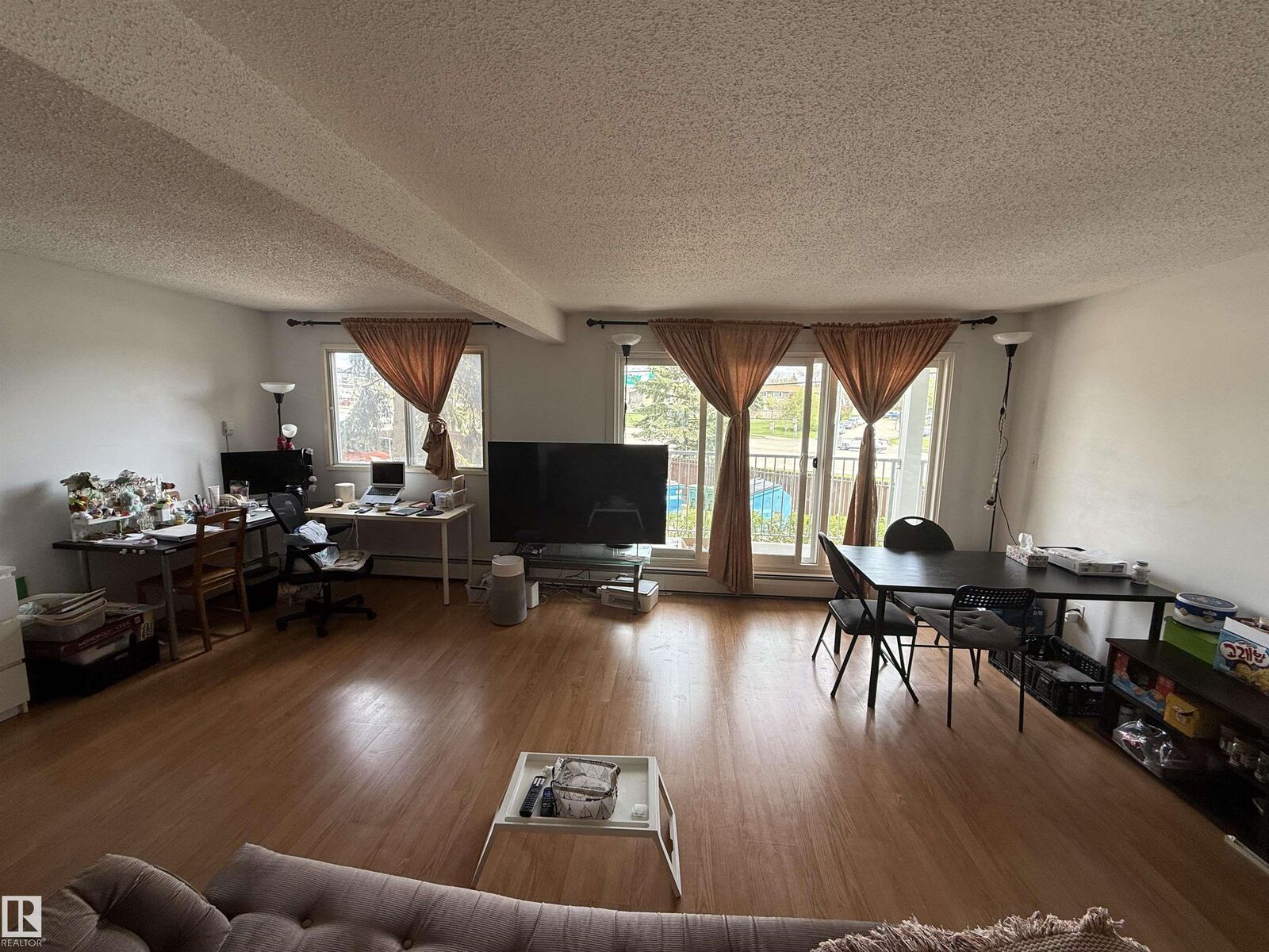Property Photo: 4404 122 Street NW 225 AB T6J 4A9