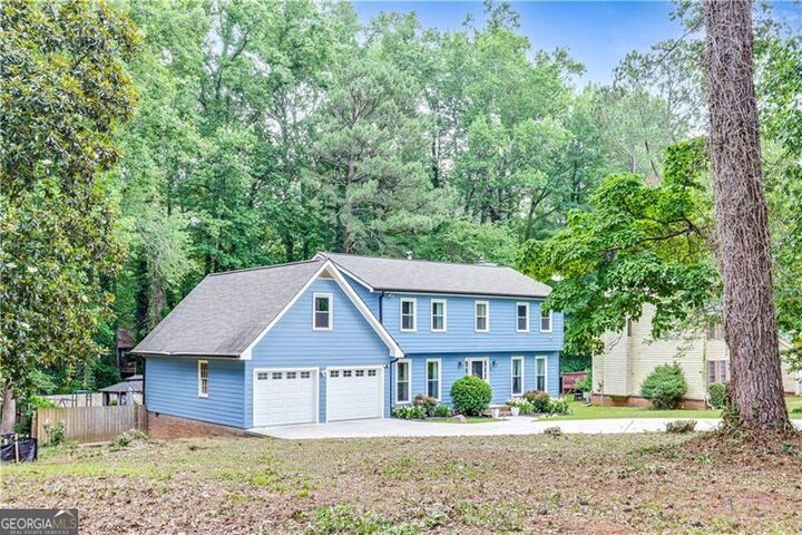 Property Photo:  5168 Hidden Hills Trace  GA 30088 