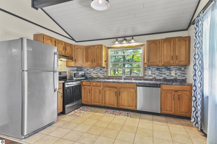 Property Photo:  10864 Redman Drive  MI 49601 