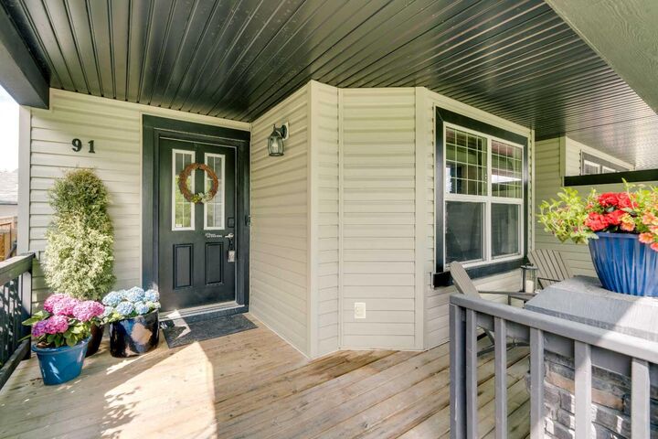 Property Photo:  91 Panora Square NW  AB T3K 0R3 