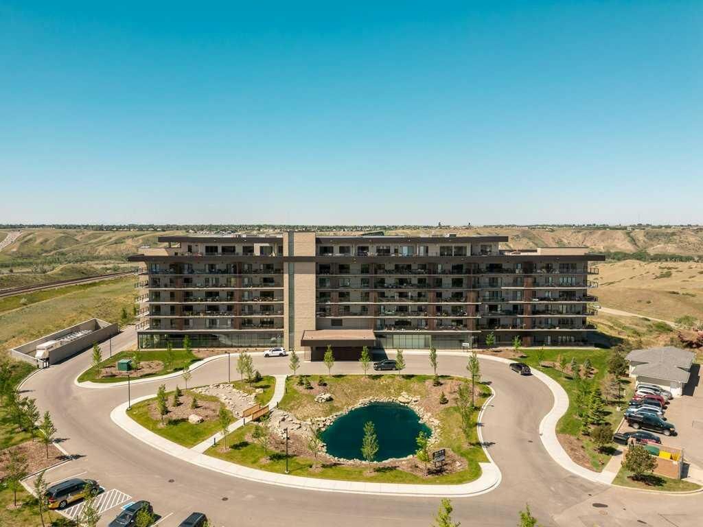 Property Photo:  102 Scenic Drive N 128  AB T1H 5L9 