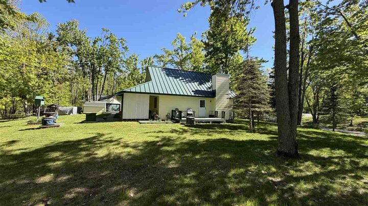Property Photo:  7774 Sandpiper  MI 49735 