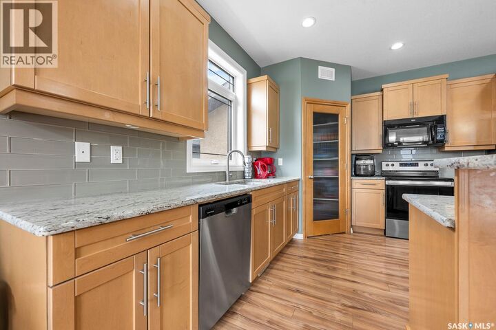 Property Photo:  1640 Maple Rose Crescent N  SK S4X 0J6 