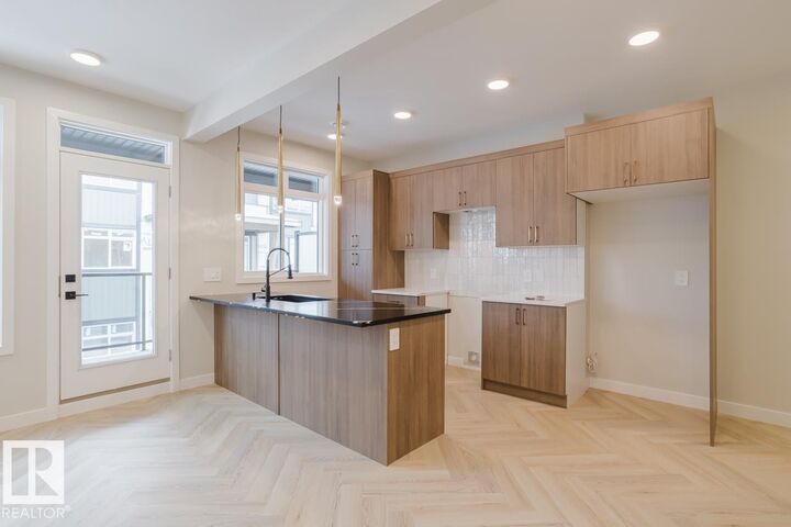 Property Photo:  16231 19 Avenue SW 11  AB T6W 5C6 
