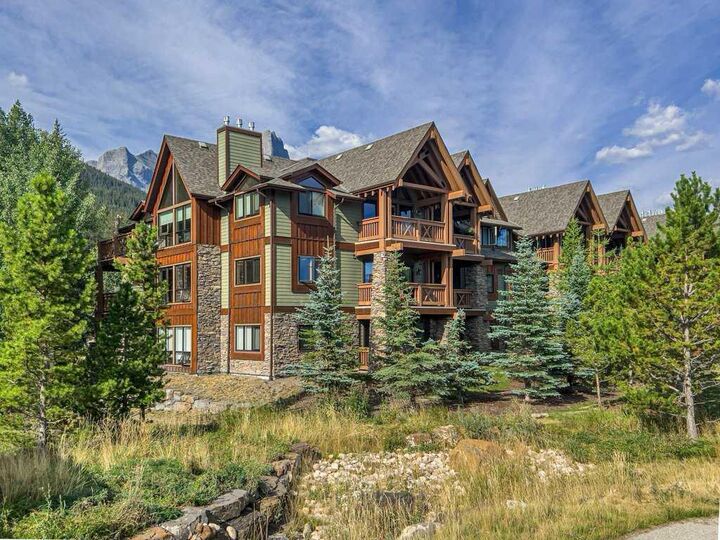 Property Photo: 106 Stewart Creek Landing 105 AB T1W 0G6