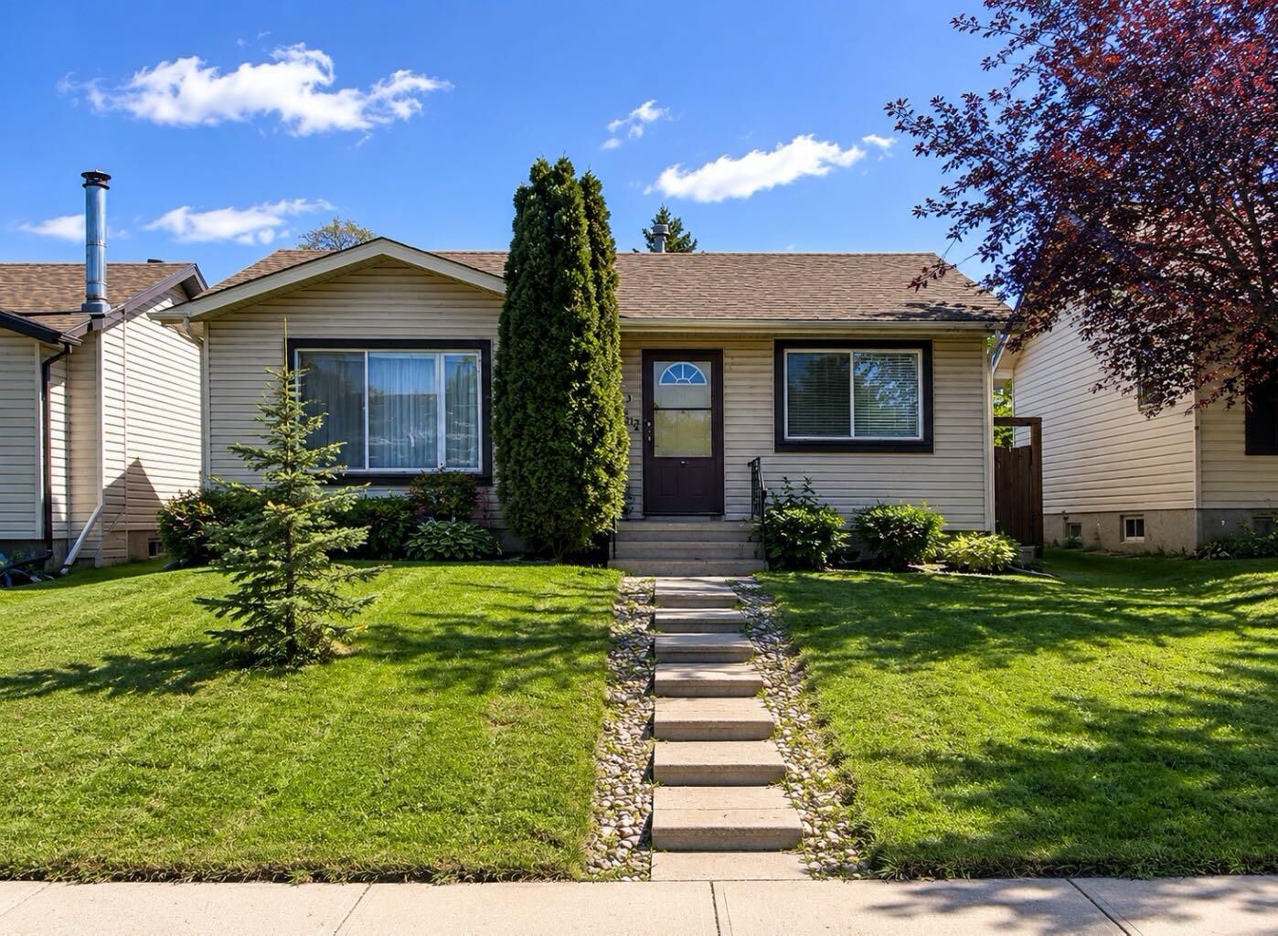Property Photo:  127 Falshire Way NE  AB T3J 2C7 