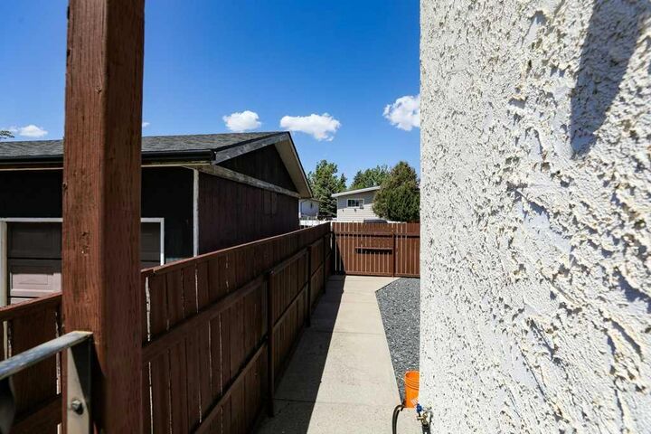 Property Photo:  729 Columbia Boulevard W  AB T1K 5H1 