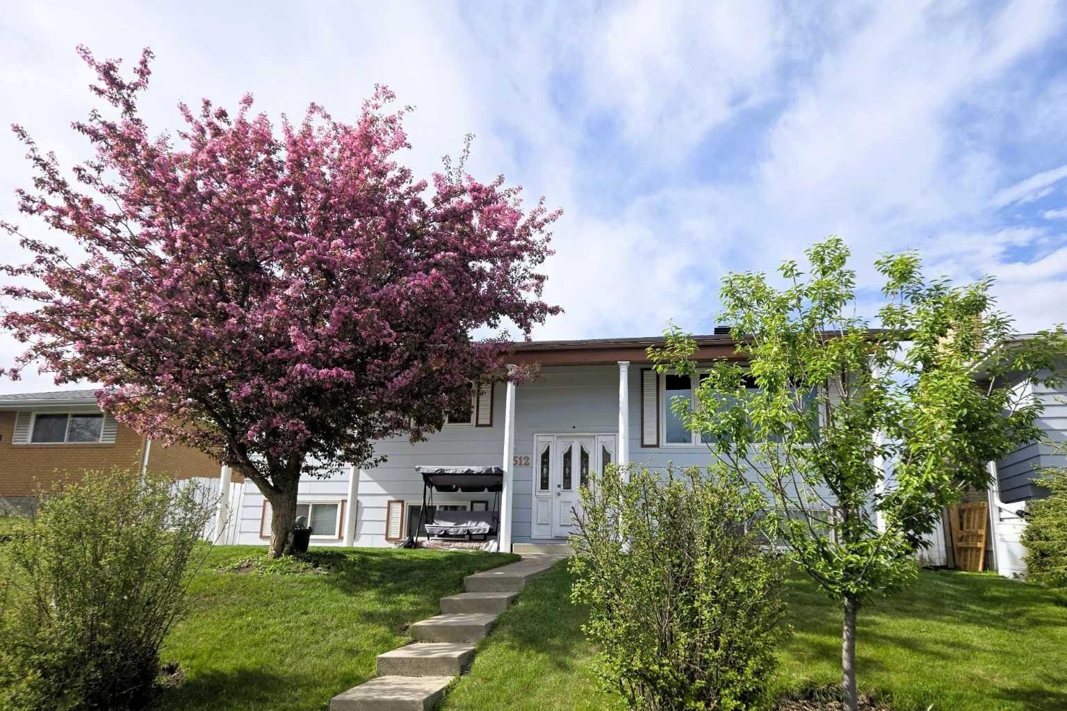 Photo de la propriété: 512 Hunterplain Hill NW AB T2K 4L7