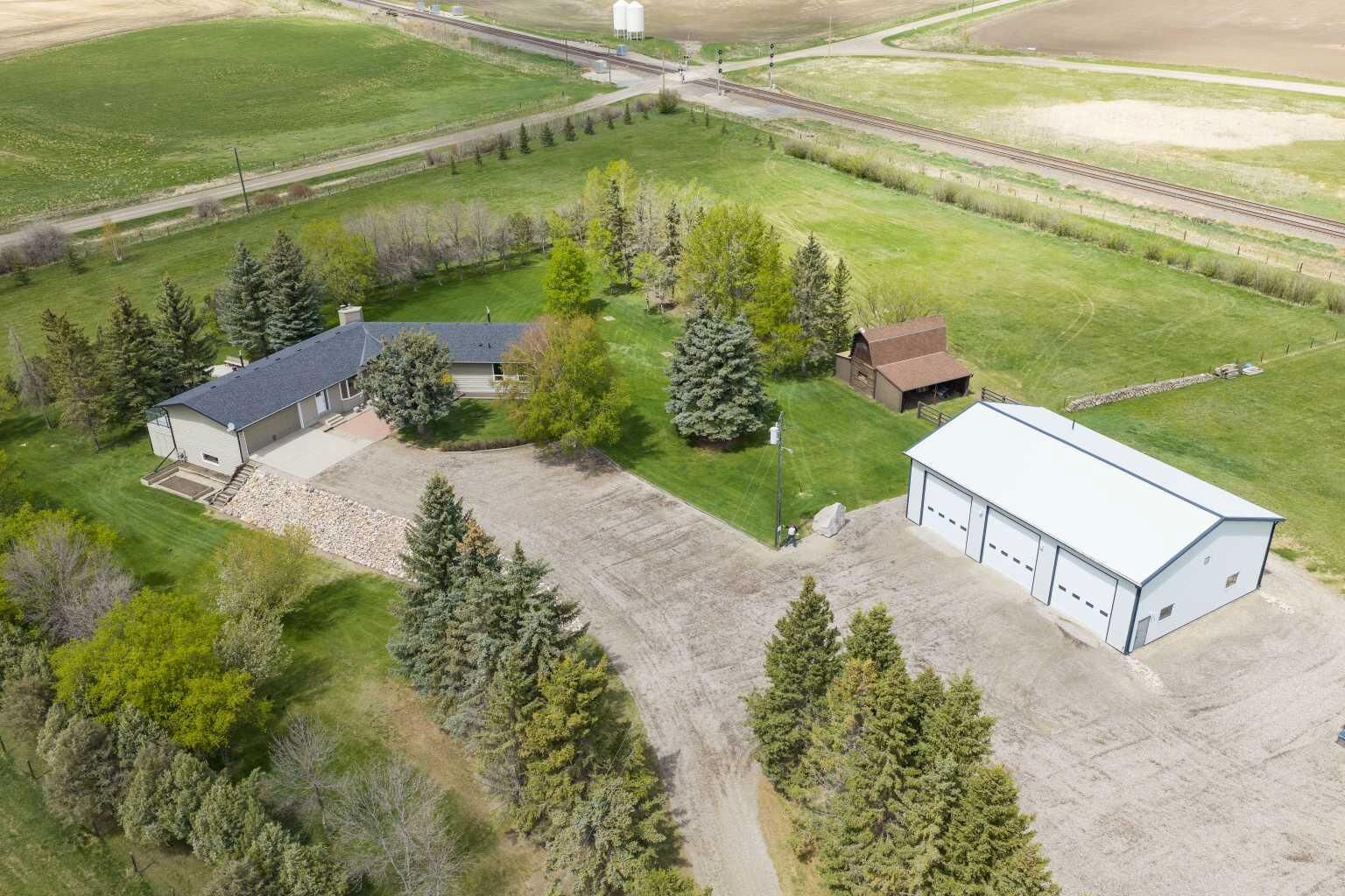 Property Photo: 221083 Range Road 270 AB T1P 2G5