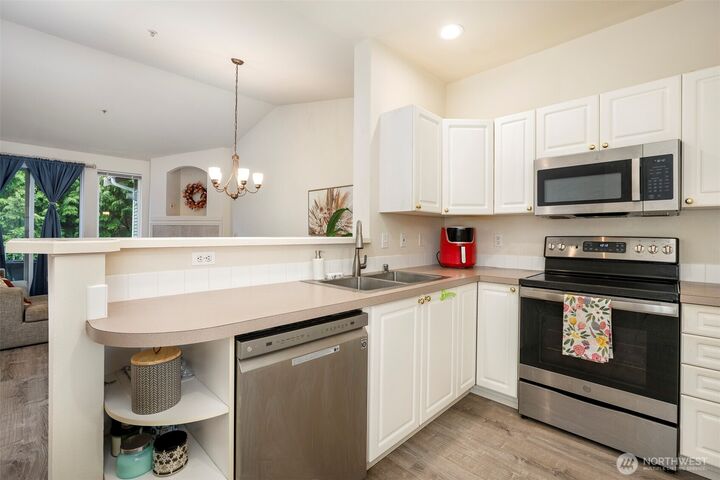 Property Photo:  12712  Admiralty Way G302  WA 98204 