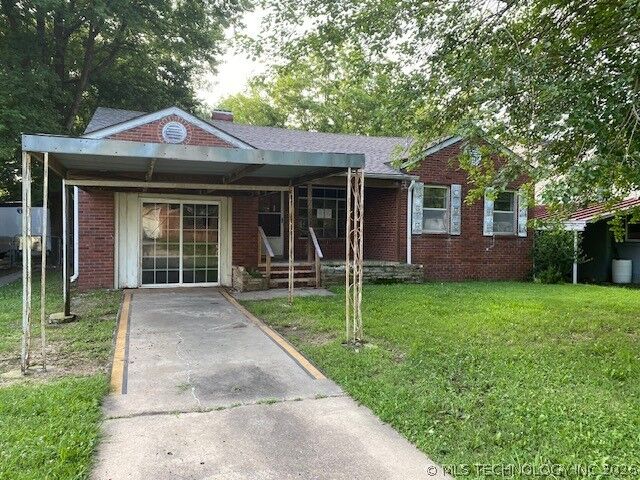 Property Photo: 1008 N K Street OK 74403