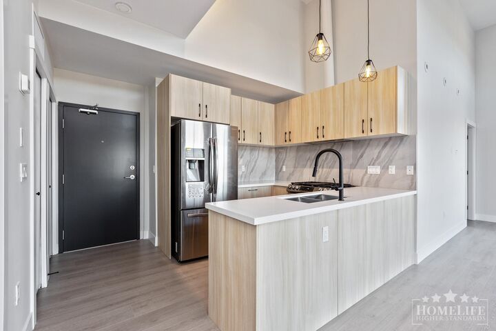 Property Photo:  14858 60 Avenue 302  BC V3S 0B5 
