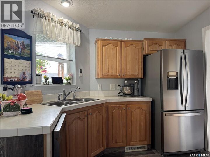 Property Photo:  301 Tesky Crescent  SK S0A 4T0 