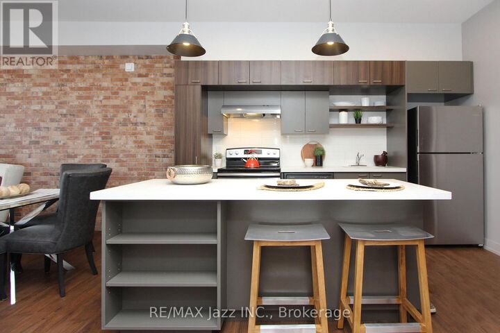 Property Photo:  14 1/2 King Street East 207  ON L1H 1A9 