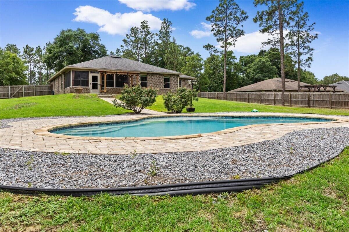 Property Photo:  6458 Welannee Boulevard  FL 32567 
