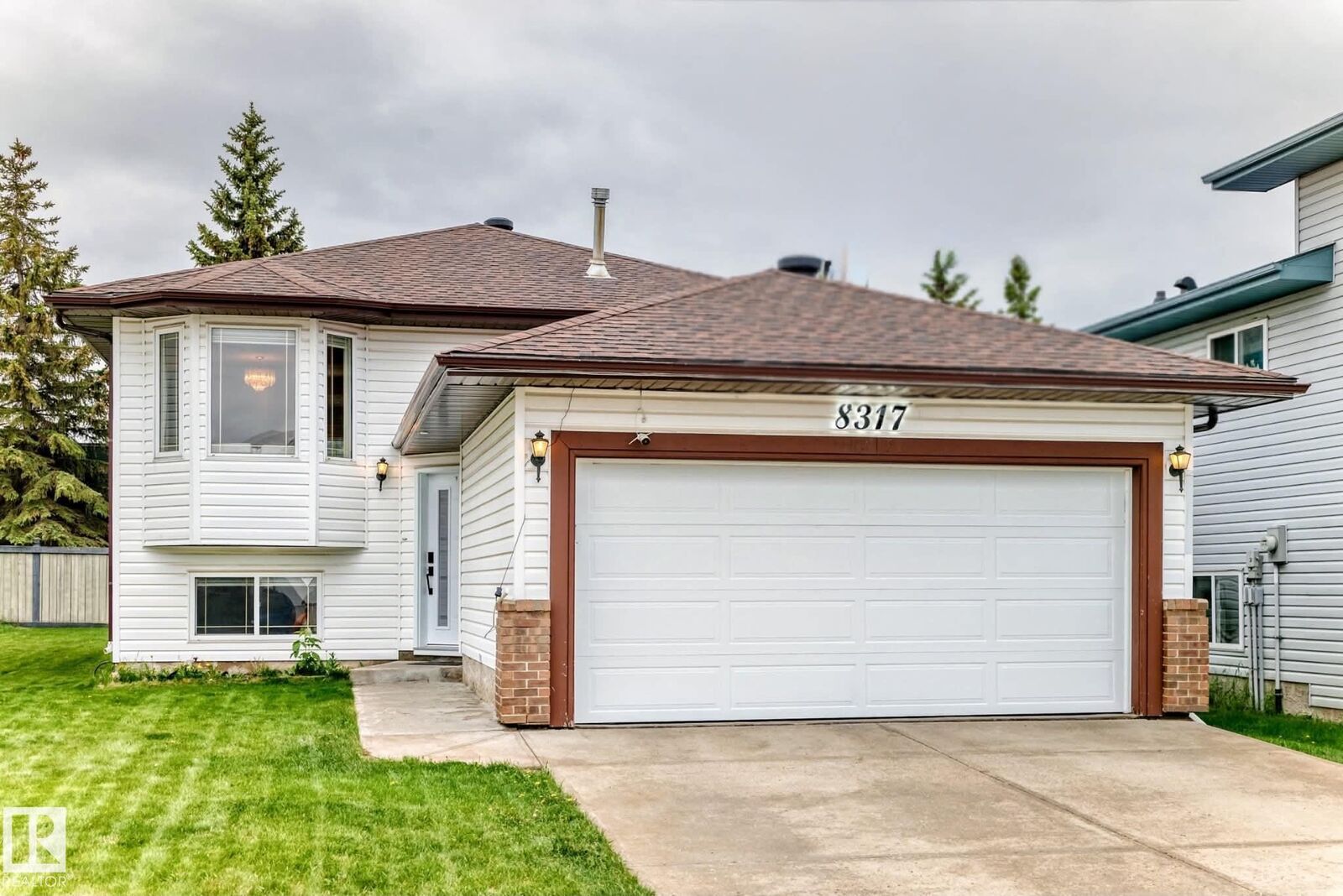 Property Photo:  8317 160A Avenue NW  AB T5Z 3G4 