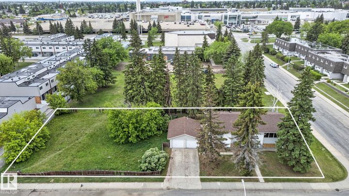 Property Photo:  13908 64 Street NW  AB T5A 1R9 