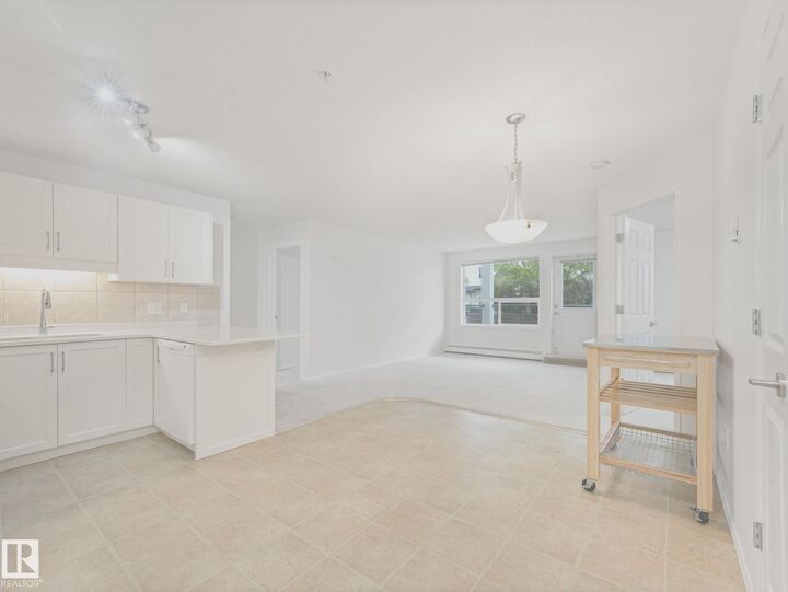Property Photo:  13635 34 Street NW 117  AB T5A 0C4 