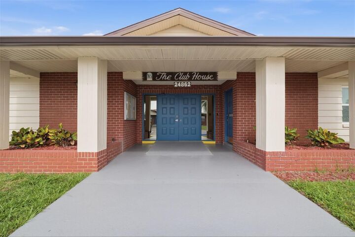 Property Photo: 24862 US Highway 19 N 1705 FL 33763