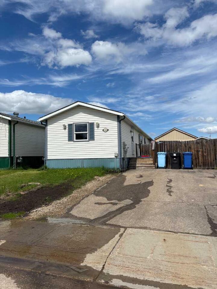 Property Photo: 120 Hunter Street AB T9K 2K6