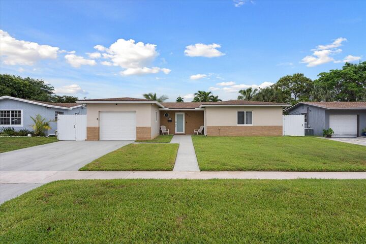 Property Photo:  6515 SW 8th Place  FL 33068 