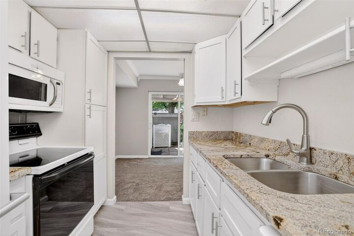 Property Photo: 7853 W 87th Drive CO 80005