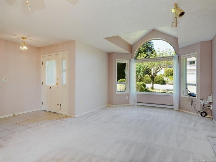 Property Photo:  6749 Rhodonite Dr  BC V9Z 0H7 