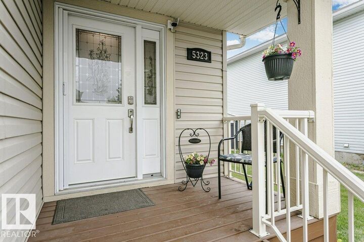 Property Photo:  5323 Rue Parc Street  AB T4X 1W4 