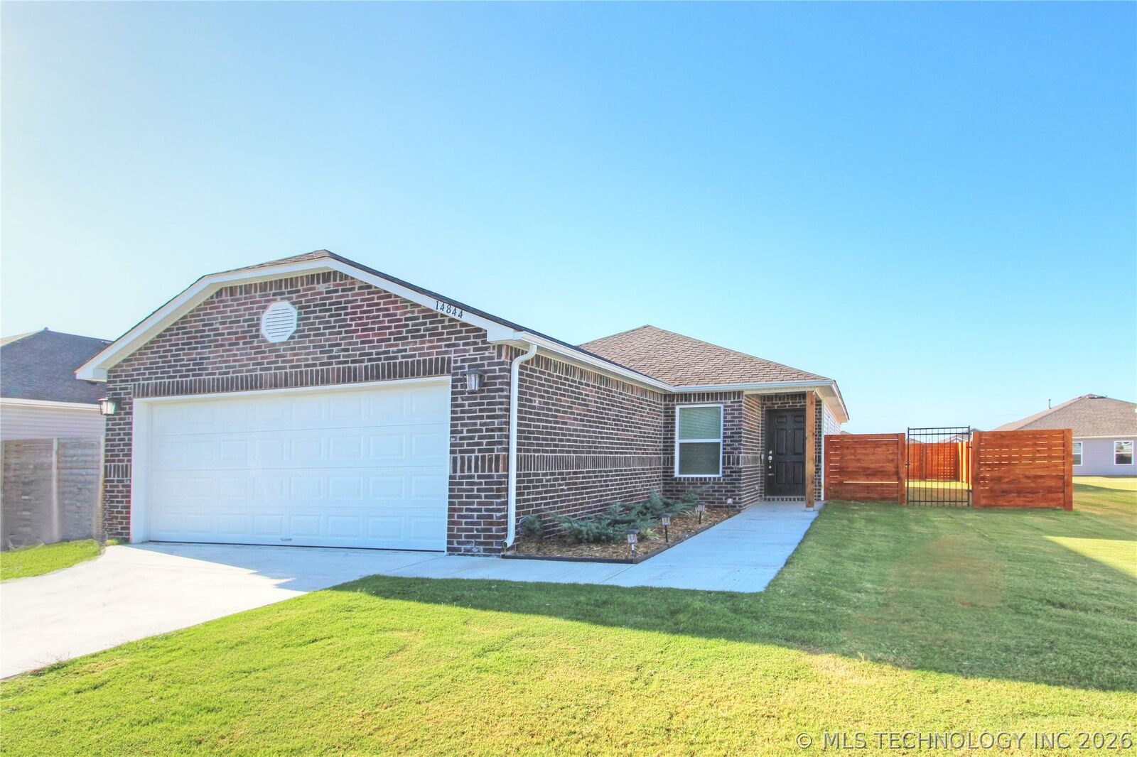 Property Photo:  14844 E 38th Street S  OK 74134 