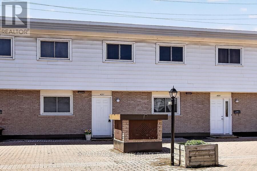 Property Photo: 427 Moodie Drive ON K2H 8A4
