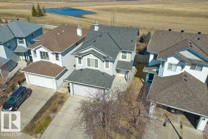 Property Photo:  716 McAllister Loop SW  AB T6W 1X8 