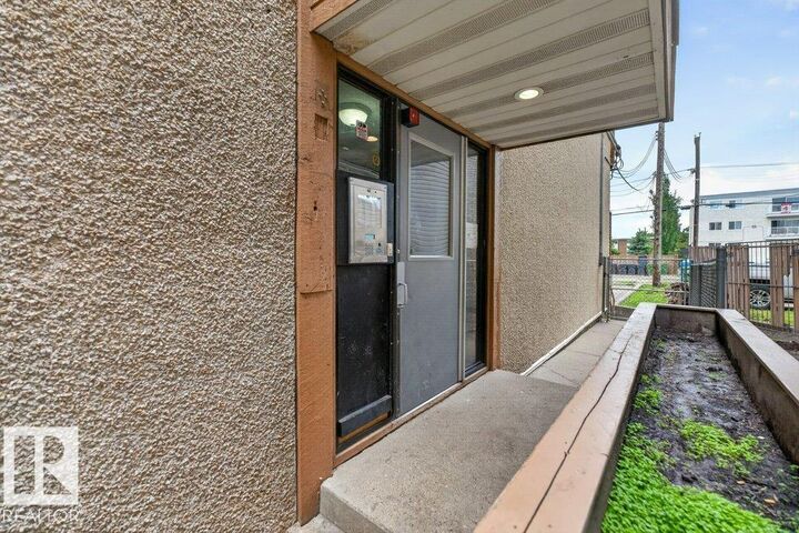 Property Photo:  10620 104 Street NW 103  AB T5H 2W2 