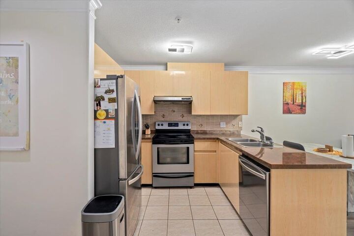 Property Photo: 8115 121A Street 309 BC V3W 1J2