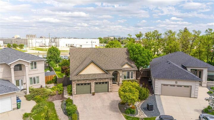 Property Photo:  64 Tangle Ridge Crescent  MB R3Y 1Y2 