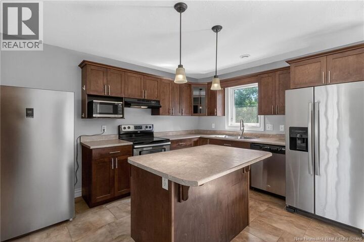 Property Photo: 57 Whisperwood Drive NB E1G 0P7