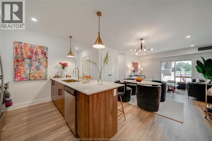 Property Photo:  11957 Tecumseh Road East 204  ON N8R 1L0 