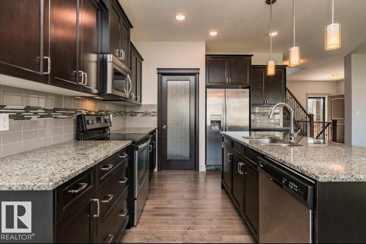 Property Photo: 5912 19 Avenue SW AB T6X 2A2